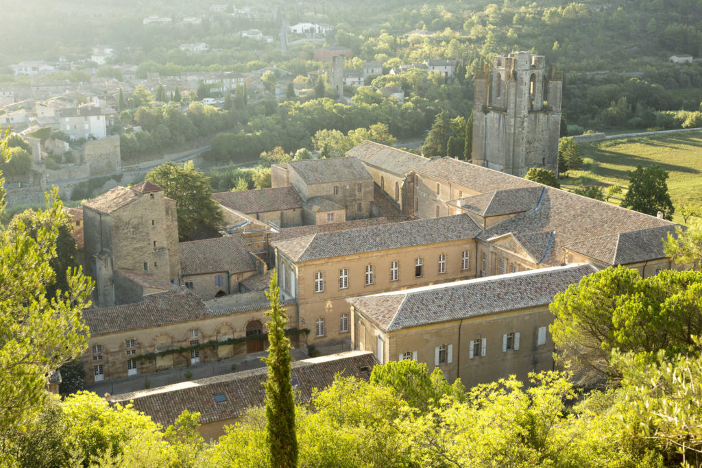 This is a top-view drone photo of Lagrasse Abbey and the south transept in dire need of restoration. Lagrasse Abbey is one of the most prestigious religious monuments in the South of France.